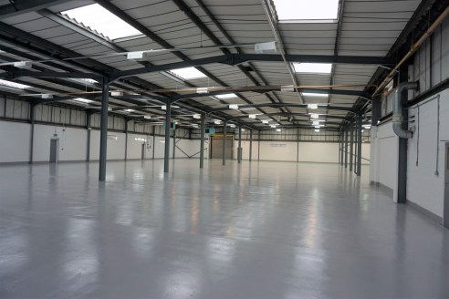 The premises is of steel portal frame construction in 3 bays with a 2 storey brick built office area to the front and a further single storey brick built area housing welfare and canteen facilities.

The building offers a good mix of warehouse/manufa...