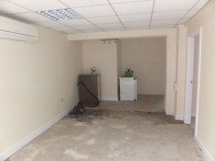 Ground floor lock up convenient shop, with rear store room 57.24m&sup2; (616ft&sup2;)

Immediately available

Asking Rent &pound;6,000 pa