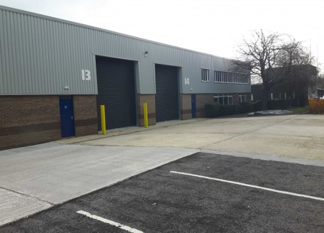 Detached refurbished industrial/warehouse unit of steel frame construction under a brand new insulated pitched roof incorporating rooflights. 6.22m (20'4) internal eaves height. 3 phase electricity, 2 new electric roller shutter loading doors. 2 stor...