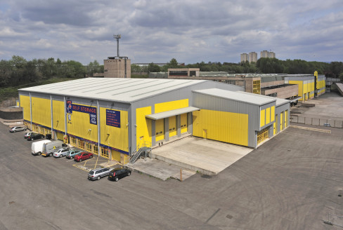 Modern single storey warehouse. Mix of drive in and dock level loading doors to the front and rear of the property. Glazed offices. Internal loading area. Sodium lighting. Gas fired warm air blowers. Large amount of HGV and car parking. Secure perime...