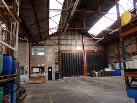 Detached industrial unit with adjoining two storey office block and single storey side extension.<br>Externally, the site provides extensive car parking and open storage land.<br><br>The property is available by way of a new full repairing and insuri...