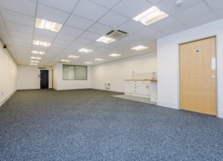 Unit 7 is a single storey office with parking to the front of the building. The unit is of a modern construction standard and is fitted with high specification lighting and carpets throughout....