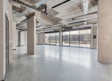 The property provides ground floor commercial use (Class B1) within a mixed-use 5 storey property. The interiors have exceptional natural light with floor to ceiling windows, contemporary suspended lighting, exposed concrete and raised floor. 

The p...