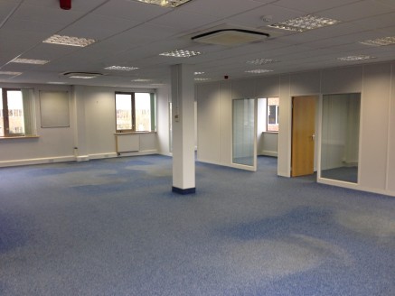 The premises comprises of a suite on the first floor within a

modern office development. The unit is open plan with 4

individual offices.