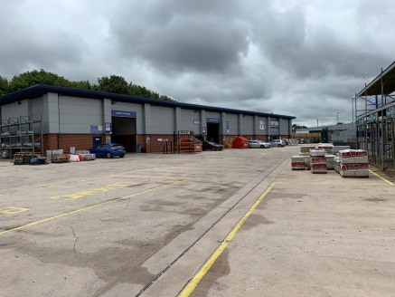 The property comprises a modern, detached, steel portal frame warehouse with an extensive yard and parking area, fronting Hattersley Way. The site is fully secured with palisade fencing with access through a single gate entry point. The building bene...