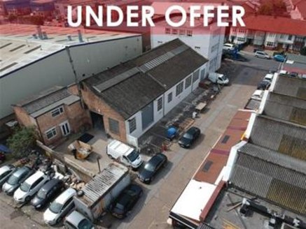 The property comprises a steel truss framed warehouse building of brick and blockwork construction to a pitched roof. Ground floor ancillary office accommodation is situated to the front in a dedicated three storey building of which the top two floor...