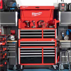 Tool Storage: A large multi-drawer tool chest sits in a workshop between two workbenches. 