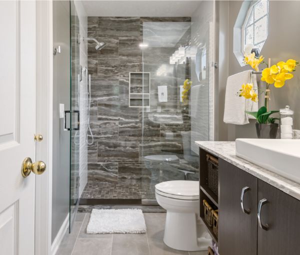 The shower with Maverick tile with a linear pattern.