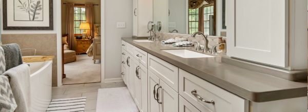 The large shower with the ProVia transom window above the freestanding tub.