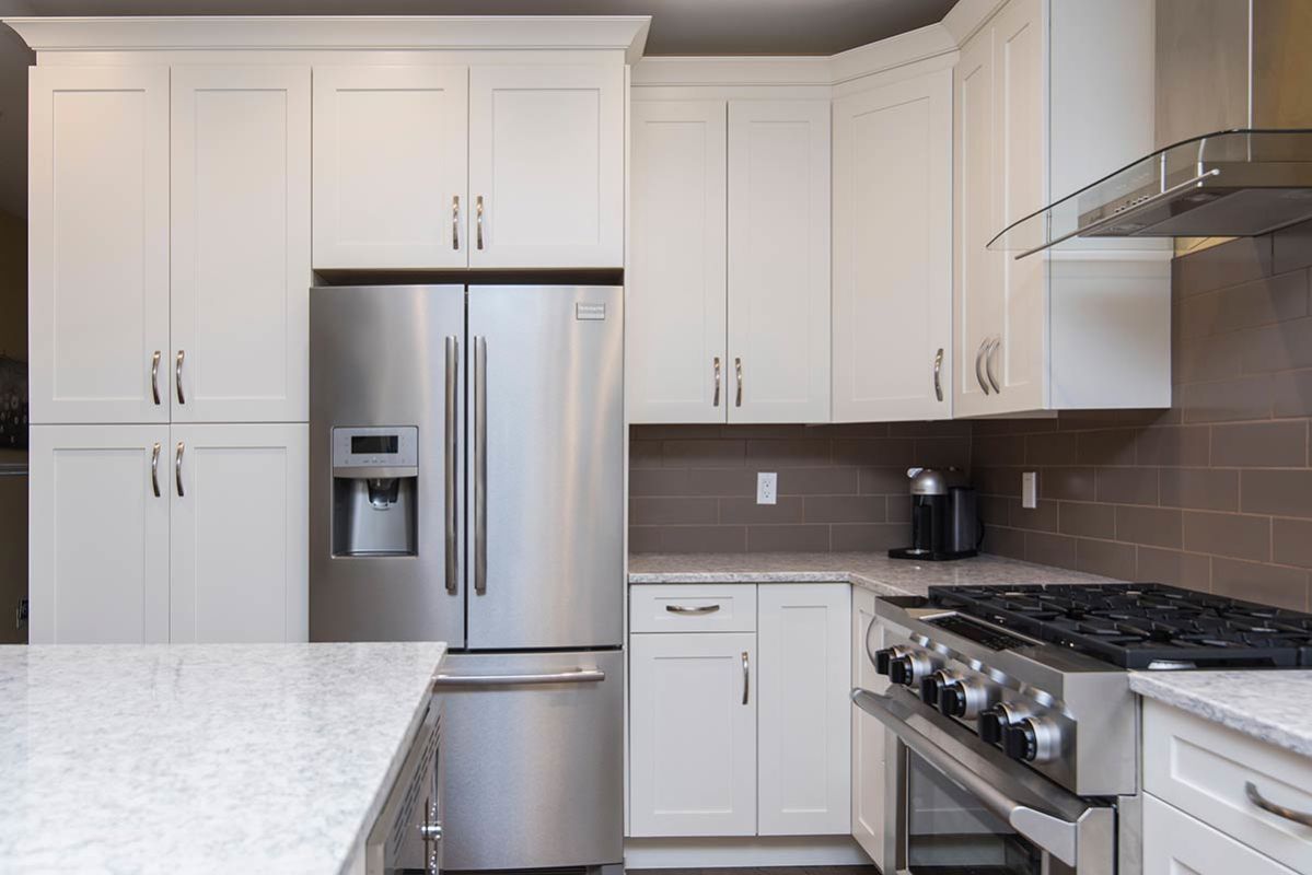 What Kind of Maintenance is Required for Solid Surface - White and Gray Countertop