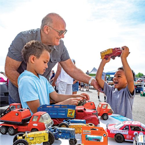 Kids with Grandfather and Toys