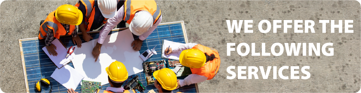 A group of construction workers gathered around blueprints at a construction site.