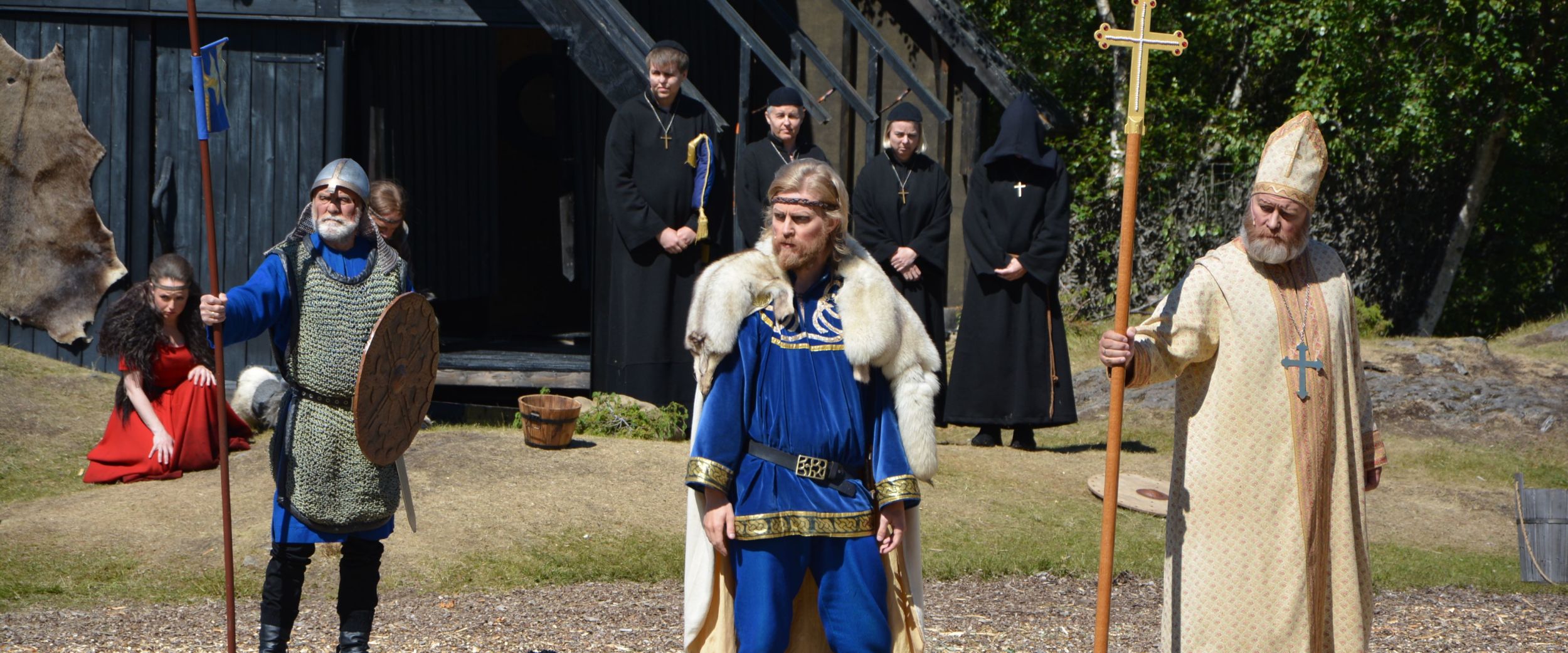 Viking king with his bishop, priests and life guard. 