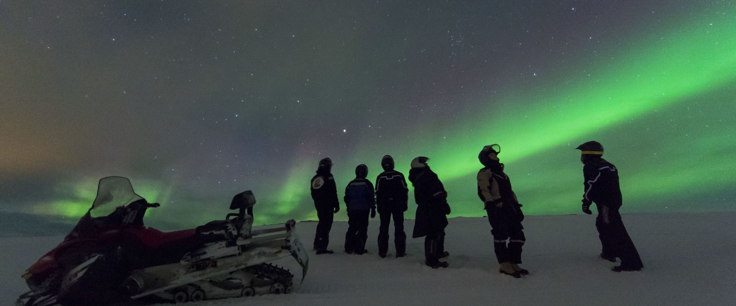 Snowmobiling in the polar night. Photo: Ørjan Bertelsen.