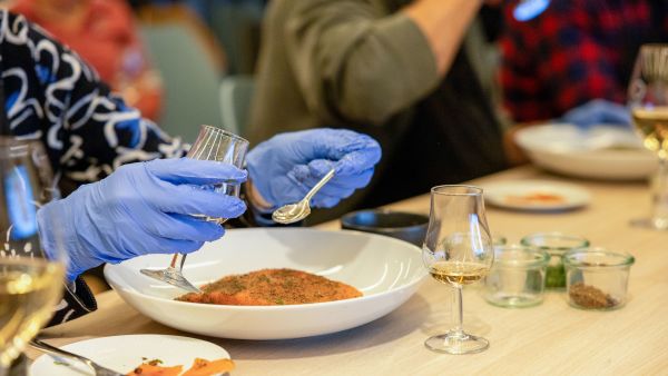 Guests take part in a gravlax course 