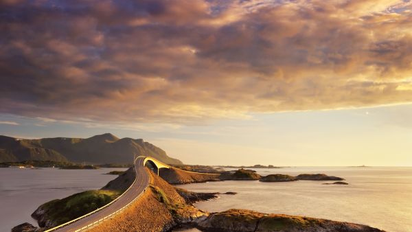 The Atlantic Road, beautifully coloured by the sunset. Photo: Jacek rózycki, visitnorway.com