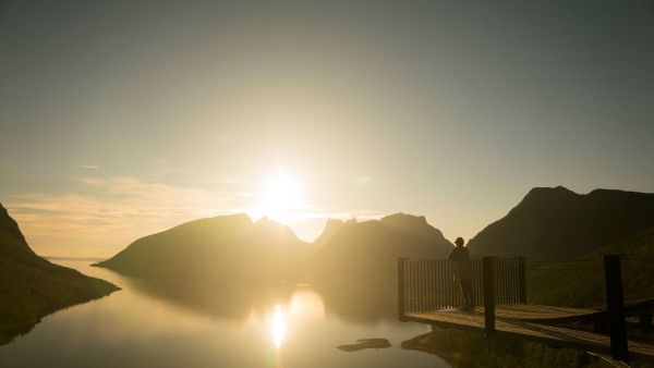 Viewpoint at Senja in the midnight sun. Photo: Alexander Benjaminsen, visitnorway.com