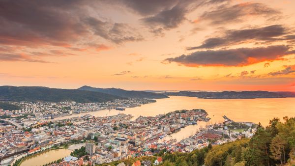 Sunset with orange and purple colours over Bergen in late summer. 