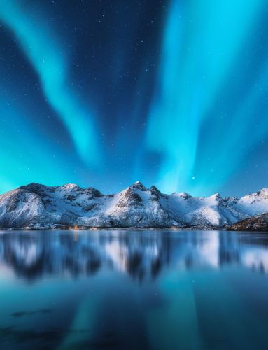 winter northern lights mountain snow