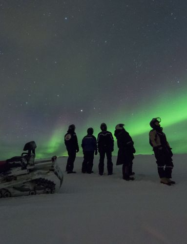 Snowmobiling in the polar night. Photo: Ørjan Bertelsen.