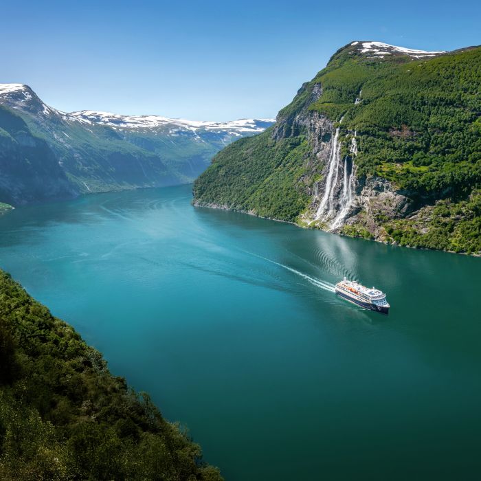 Geiranger ship sailing in fjord