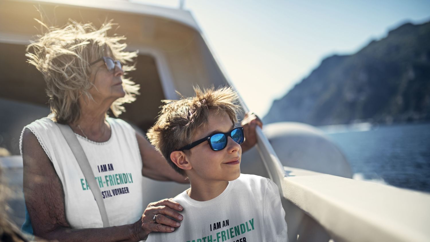 Grandma and grandchildren with earth-friendly coastal voyager t-shirts. Getty/Havila.