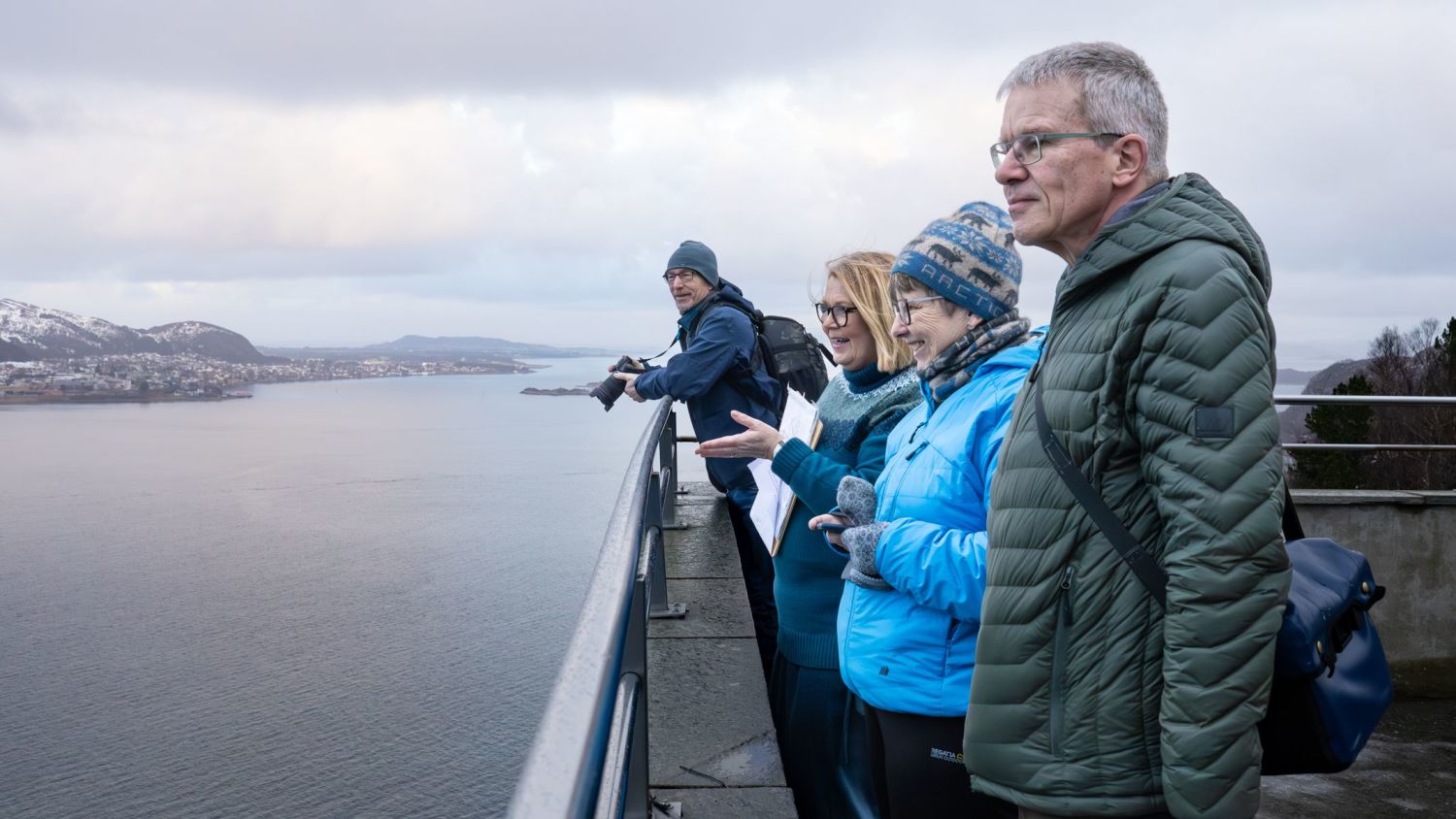 Havila Voyages excursion, guests enjoying the view overlooking the city of Ålesund Norway, from the view point at Fjellstua on Mount Aksla.