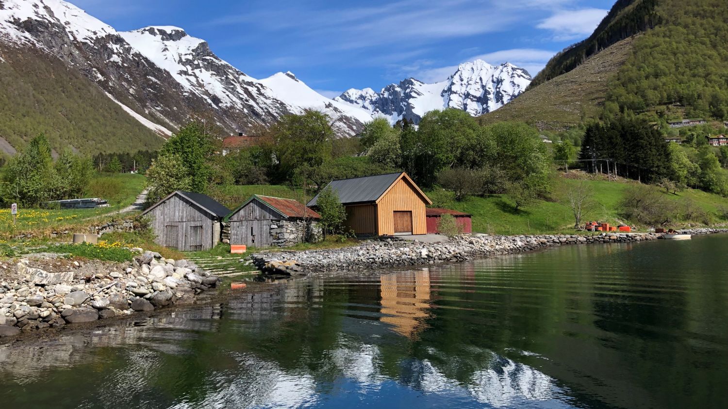 Boathouses by the fjord in the little hamlet Urke