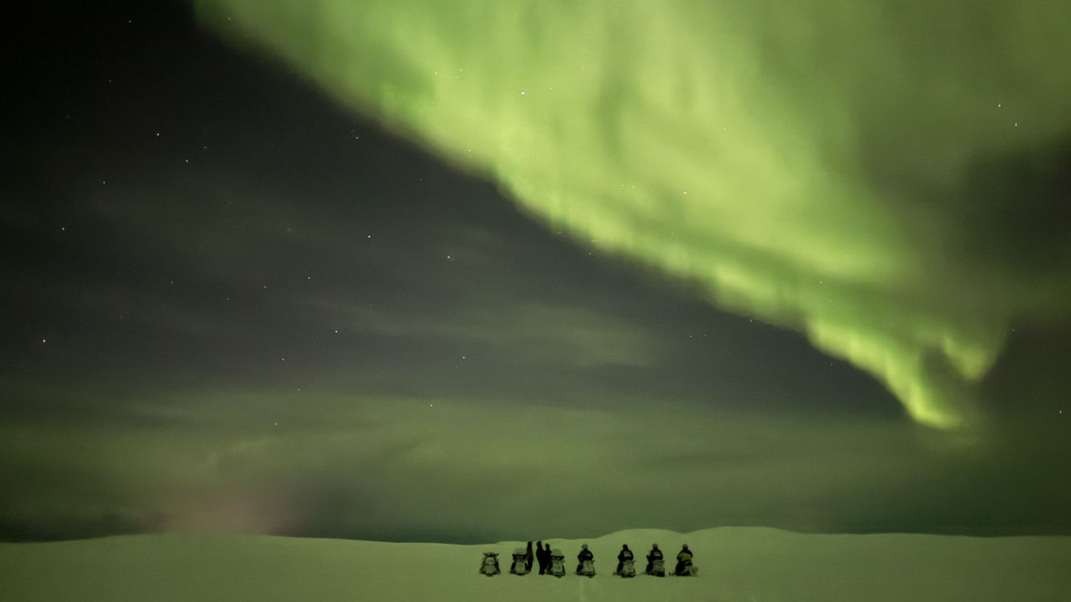 magnificent snow scooter safari with northern lights