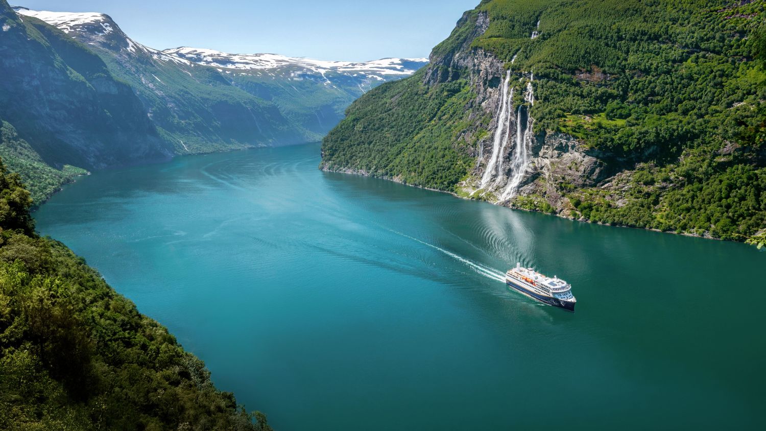 Geiranger ship sailing in fjord