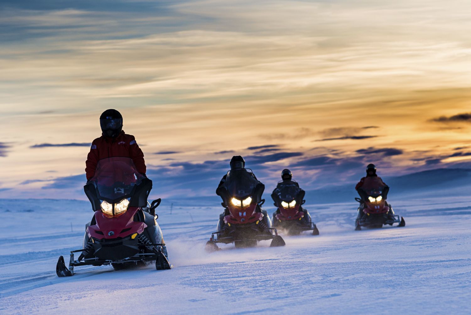 Snowmobiling in the polar night. Photo: Ørjan Bertelsen.