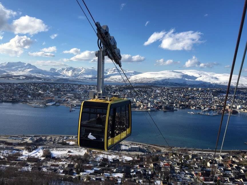 Yellow cable car in Tromsø, to viewpoint over the city. 