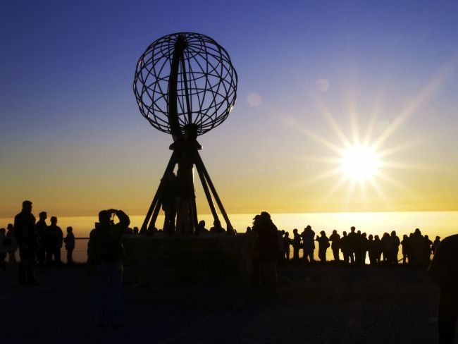 Midnight sun at the North Cape, Photo: Karl Thomas, visitnorway.com