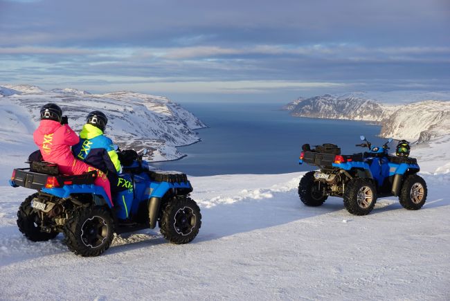 Quadbiking with fjordview at the Northcape in the winter.