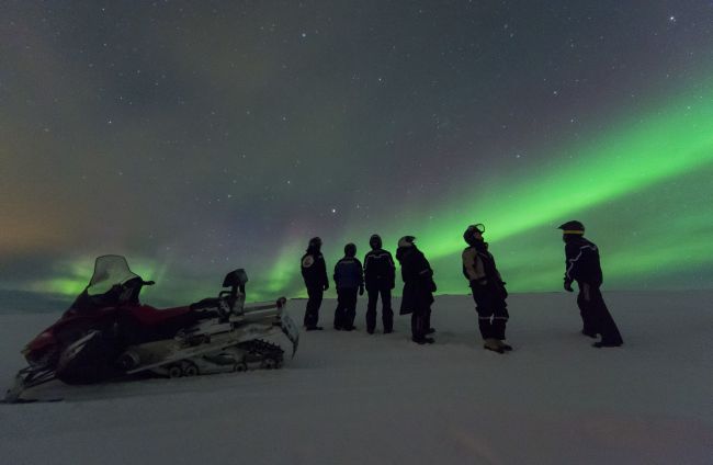 Snowmobiling in the polar night. Photo: Ørjan Bertelsen.