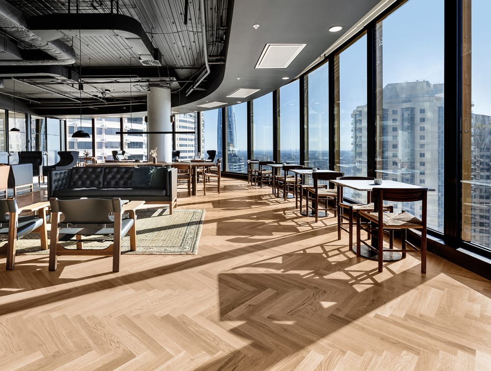 Work Club Sydney featuring HW16002 Pallido Herringbone timber flooring