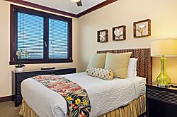 Beach Villas at Ko Olina O-1105 - The guest bedroom features a queen bed and natural lighting.