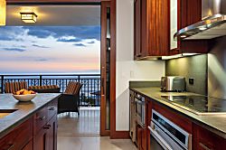 Beach Villas at Ko Olina O-1402 - The fully-equipped kitchen has top tier appliances and direct access to the lanai with vie