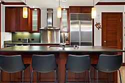 Beach Villas at Ko Olina O-1402 - Alternate View of Kitchen with top of the line appliances and breakfast bar.