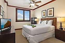 Beach Villas at Ko Olina O-1402 - The second guest bedroom with queen size bed, flat screen TV and ceiling fan in our Ko Oli