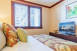 Beach Villas at Ko Olina O-521 - The second guest room with sun dappled views and TV.