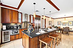 Beach Villas at Ko Olina B-308 - Warm wood tones meet modern luxury in this spacious kitchen—ideal for big breakfasts or su