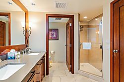Beach Villas at Ko Olina O-210 - Featuring a separate toilet area enclosed by a stylish door.