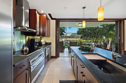 Beach Villas at Ko Olina B-107 - The kitchen features stainless steel appliances and lovely views