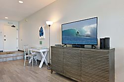 Napili Point B5 - Relax with a movie on the large flat-screen TV, or catch up on emails at the dedicated des
