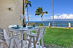 Napili Point B5 - Enjoy morning coffee or evening cocktails at your private lanai table set against a backdr