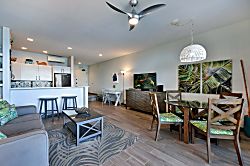 Napili Point B5 - Perfect for entertaining, this open area pairs a glass-top dining table with kitchen count