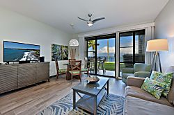 Napili Point B5 - Unwind in this bright, open living space featuring plush seating, a flat-screen TV, a cozy