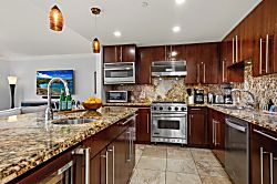 Honua Kai Hokulani 204 - A sleek kitchen built for cooking, unwinding, or a quick beach snack
