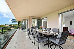 Honua Kai Konea 334 - Elegant outdoor dining on a tropical lanai with scenic views